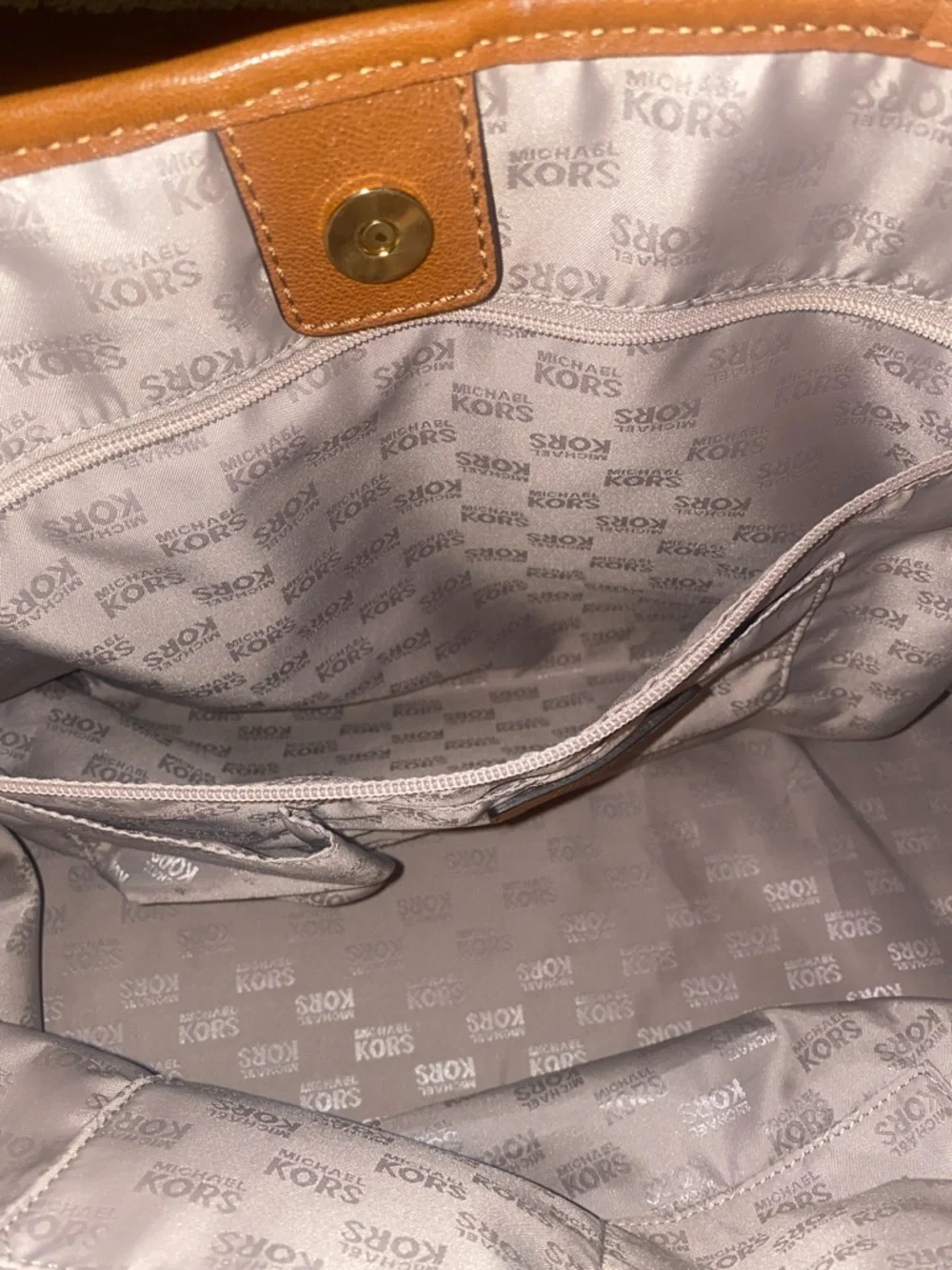 Michael Kors Raffia Tote with Tan Leather Trim and handles.